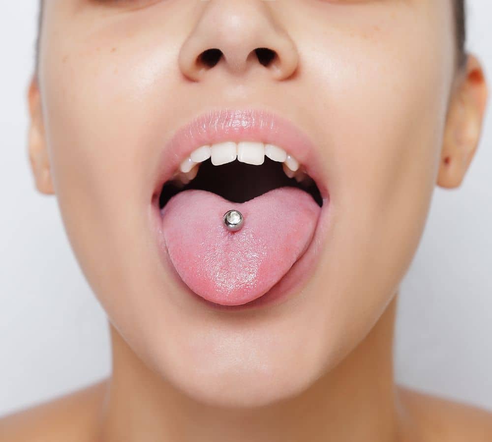 Are tongue and lip piercings bad for teeth?