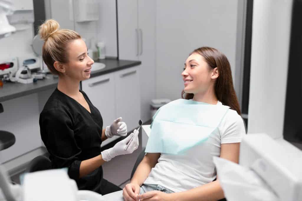 medium shot patient dentist clinic 23 2149164300 1